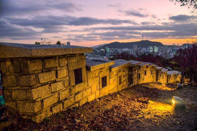 Following the Enchanting Lights of Seouls Night View - Exploring Naksan Parks Hidden Gems