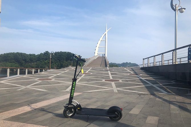 Jeju Kickscooter Fun & Exciting Riding by Seashore - Safety First: Helmet and Insurance